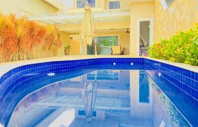 Imagem: A casa em condomínio possui 5 Dormitórios, 5 Banheiros, 2