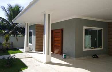 Imagem: A casa possui 3 Dormitórios, 3 Banheiros, 2 Vagas na garagem