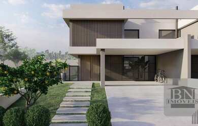 Imagem: A casa possui 3 Dormitórios, 3 Banheiros, 2 Vagas na garagem