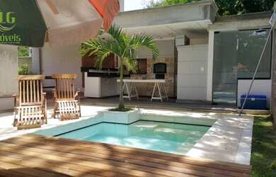 Imagem: A casa em condomínio possui 3 Dormitórios, 5 Banheiros, 450m²