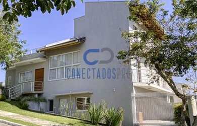 Imagem: A casa em condomínio possui 4 Dormitórios, 5 Banheiros, 4