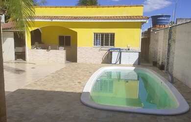 Imagem: A casa possui 2 Dormitórios, 2 Banheiros, 4 Vagas na garagem