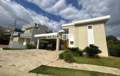 Imagem: A casa em condomínio e possui 3 Dormitórios, Suítes, 5 Banheiros