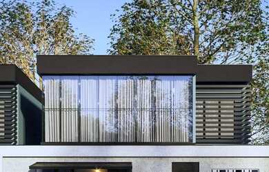 Imagem: A casa possui 3 Dormitórios, 3 Banheiros, 2 Vagas na garagem