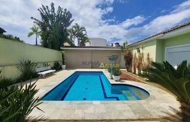 Imagem: A casa em condomínio possui 4 Dormitórios, 5 Banheiros, 4