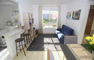 Imagem: O apartamento possui 2 Dormitórios, 1 Banheiro, 1 Vaga na garagem