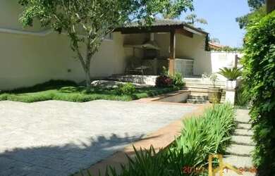 Imagem: A casa em condomínio possui 4 Dormitórios, 5 Banheiros, 4