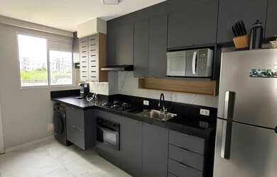 Imagem: O apartamento possui 2 Dormitórios, 1 Banheiro, 1 Vaga na garagem