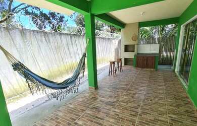 Imagem: A casa possui 4 Dormitórios, 4 Banheiros, 2 Vagas na garagem