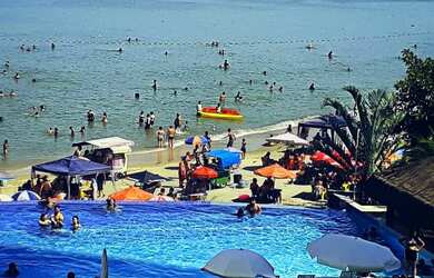 Imagem 5: Aluga temporada apartamento pé na areia na Prainha em Caraguatatuba