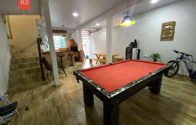 Imagem: A casa possui 3 Dormitórios, 2 Banheiros, 2 Vagas na garagem