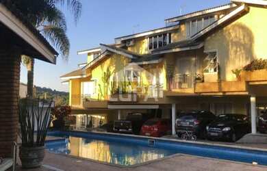 Imagem: A casa em condomínio possui 3 Dormitórios, 3 Banheiros, 3