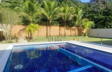 Imagem: A casa em condomínio possui 5 Dormitórios, 5 Banheiros, 5