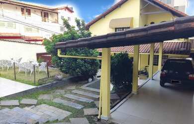 Imagem: A casa possui 4 Dormitórios, 4 Banheiros, 5 Vagas na garagem