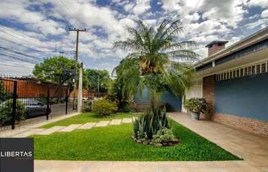 Imagem 3: Casa residencial para locação no bairro Sarandi, com 210m², 3 dormitórios, 1 suíte, 3 vaga