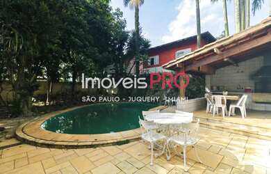 Imagem: A casa possui 4 Dormitórios, 5 Banheiros, 5 Vagas na garagem