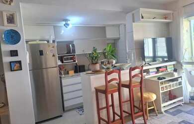 Imagem: O apartamento possui 2 Dormitórios, 1 Banheiro, 1 Vaga na garagem