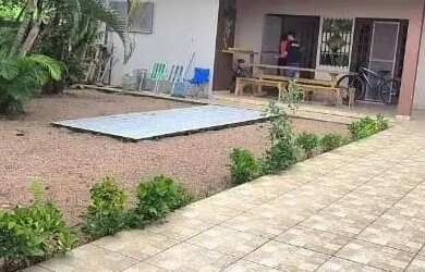 Imagem: A casa possui 3 Dormitórios, 2 Banheiros, 3 Vagas na garagem