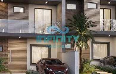 Imagem: A casa possui 3 Dormitórios, 2 Banheiros, 2 Vagas na garagem