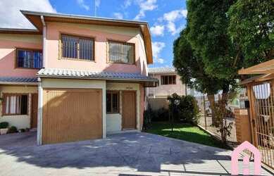 Imagem: A casa possui 3 Dormitórios, 1 Banheiro, 2 Vagas na garagem