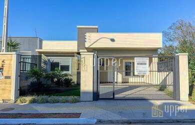 Imagem: A casa possui 3 Dormitórios, 2 Banheiros, 2 Vagas na garagem