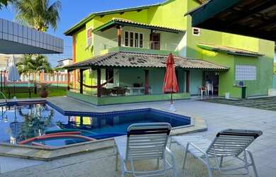 Imagem: A casa possui 5 Dormitórios, 5 Vagas na garagem e está localizado