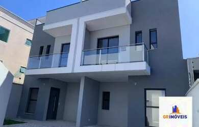 Imagem: A casa possui 3 Dormitórios, 3 Banheiros, 1 Vaga na garagem