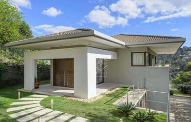 Imagem: A casa em condomínio possui 5 Dormitórios, 5 Banheiros, 4