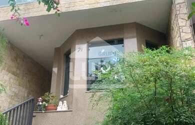 Imagem: A casa possui 3 Dormitórios, 5 Banheiros, 5 Vagas na garagem