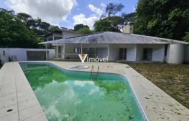 Imagem: A casa possui 3 Dormitórios, 5 Banheiros, 5 Vagas na garagem