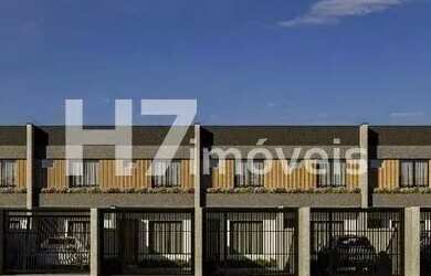 Imagem 2: Geminados com duas suítes à venda