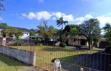 Imagem: A casa possui 3 Dormitórios, 1 Banheiro, 1 Vaga na garagem