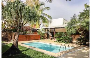 Imagem: A casa em condomínio possui 4 Dormitórios, 5 Banheiros, 2