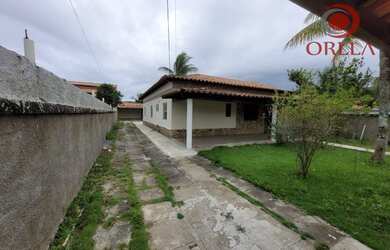 Imagem: A casa possui 3 Dormitórios, 3 Banheiros, 3 Vagas na garagem