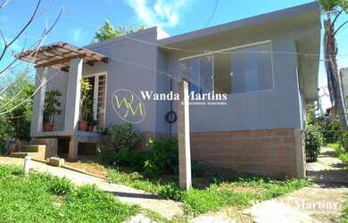 Imagem: A casa em condomínio possui 2 Dormitórios, 2 Banheiros e 420m²