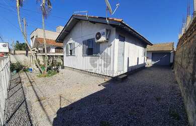 Imagem: A casa possui 3 Dormitórios, 1 Banheiro, 65m² de Área e