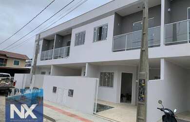 Imagem: A casa possui 3 Dormitórios, 2 Banheiros, 1 Vaga na garagem