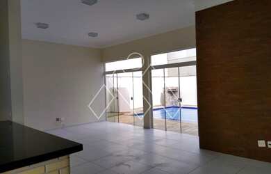 Imagem: A casa possui 3 Dormitórios, 3 Banheiros, 4 Vagas na garagem