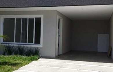 Imagem: A casa possui 3 Dormitórios, 2 Banheiros, 3 Vagas na garagem