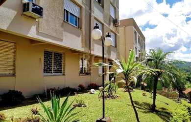 Imagem: O apartamento possui 2 Dormitórios, 1 Banheiro, 1 Vaga na garagem