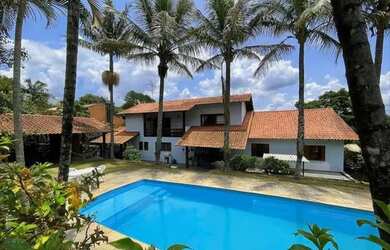 Imagem: A casa em condomínio possui 5 Dormitórios, 5 Banheiros, 5