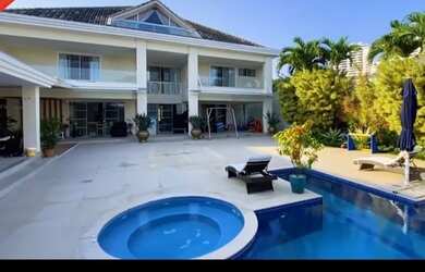 Imagem: A casa em condomínio possui 5 Dormitórios, 5 Banheiros, 4