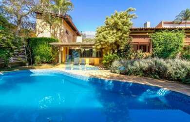 Imagem: A casa possui 5 Dormitórios, 5 Banheiros, 5 Vagas na garagem