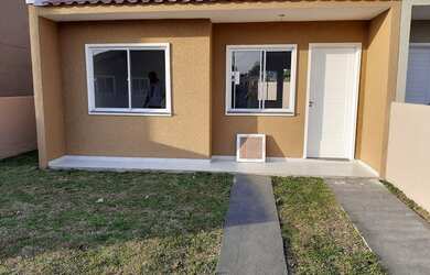 Imagem: A casa em condomínio possui 2 Dormitórios, 1 Banheiro, 2 Vagas