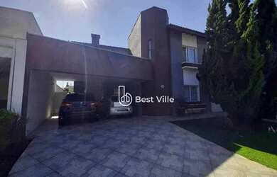 Imagem: A casa em condomínio possui 4 Dormitórios, 4 Banheiros, 4