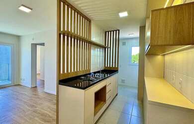 Imagem: O apartamento possui 2 Dormitórios, 1 Banheiro, 1 Vaga na garagem