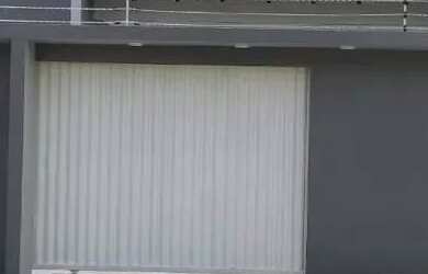 Imagem: A casa possui 3 Dormitórios, 3 Banheiros, 2 Vagas na garagem