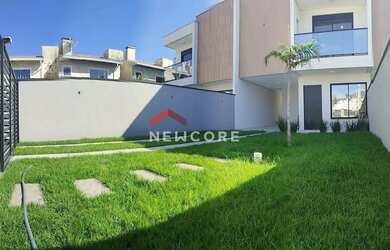 Imagem: A casa possui 3 Dormitórios, 2 Banheiros, 2 Vagas na garagem