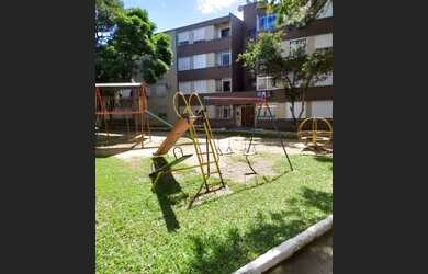 Imagem: O apartamento possui 1 Dormitório, 1 Banheiro, 1 Vaga na garagem