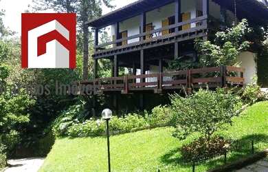 Imagem: A casa possui 5 Dormitórios, 3 Banheiros, 5 Vagas na garagem